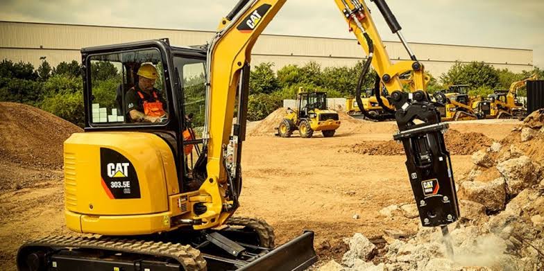 Versatile mini excavator handling precision site work, AI generated